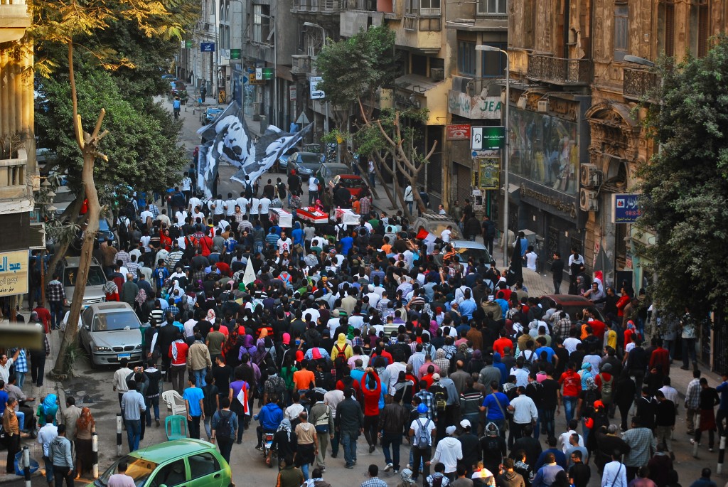 Protest in downtown Cairo toward Tahrir Square in November 2012 to commemorate the death of Gaber Salah, a revolutionary activist and member of the April 6th movement, who was killed in clashes between protesters and police. Photo by Kelsey Norman.
